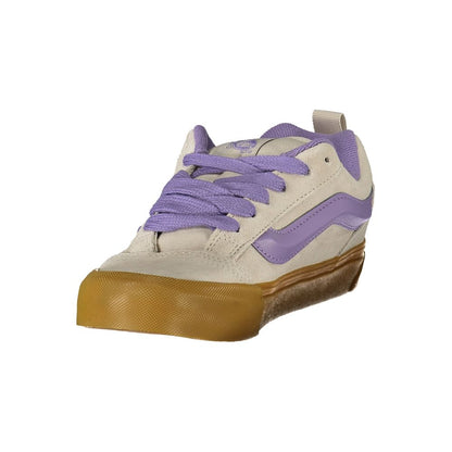 Vans Gray Leather Women Sneaker with Wisteria accents and gum sole, showcasing iconic Vans style. Ideal for casual chic fashion.