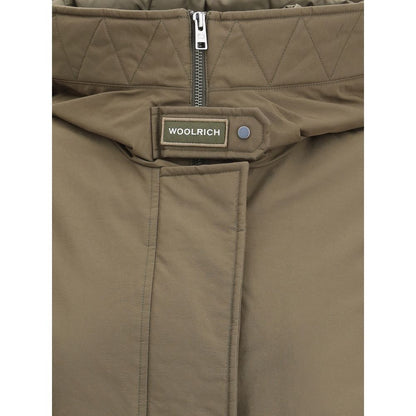 Close-up of Woolrich Green Cotton Parka with high collar, quilted design, and zipper closure.