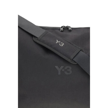 Y-3 Black Polyamide Shoulder Bag with adjustable strap and zip closure, featuring a printed logo for a contemporary style, AW25 season.