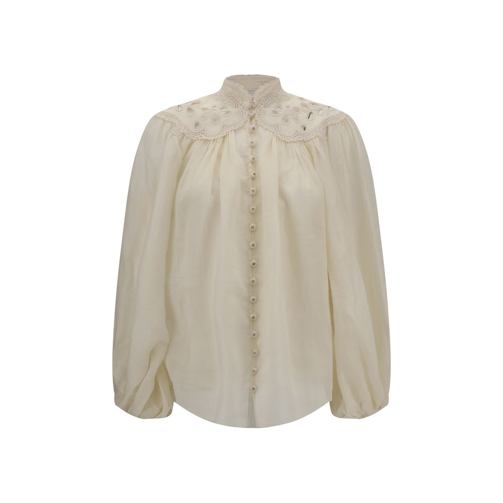 Zimmermann Cream Ramie Blouse with long puff sleeves, high neck, and lace detailing, showcasing elegant embroidered design and covered buttons.