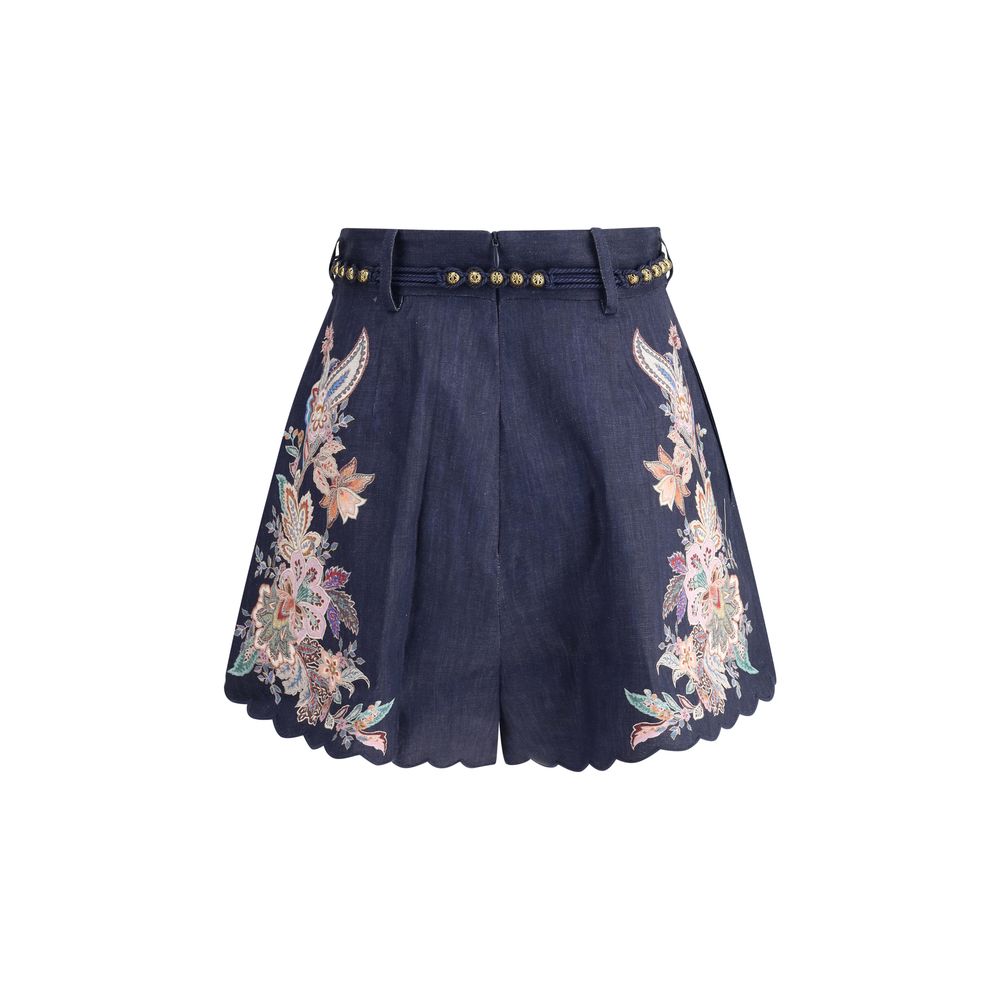 Zimmermann White Linen Bermuda Shorts with floral embroidery, scalloped hem, and belt loops for a stylish summer look.