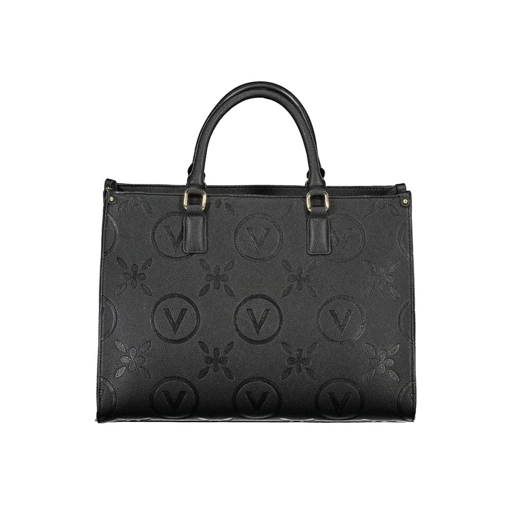 Front view with bag zipped and handles upright.